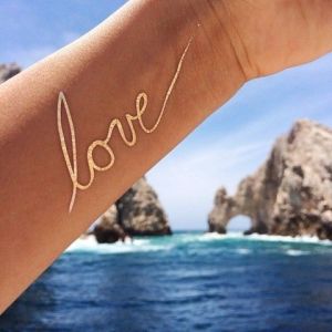 gold-love-tattoo-on-arm